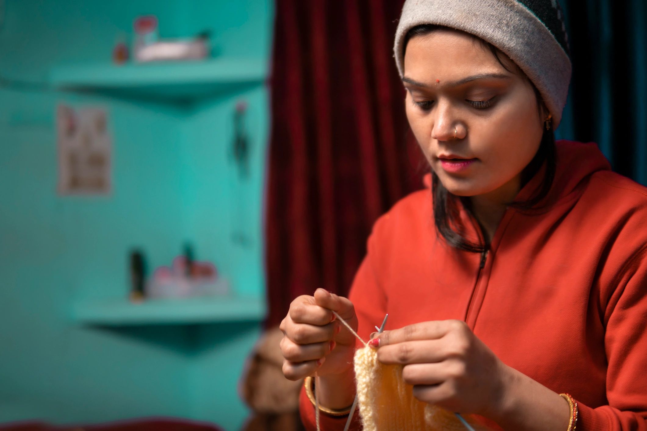 Woman working with textiles by hand