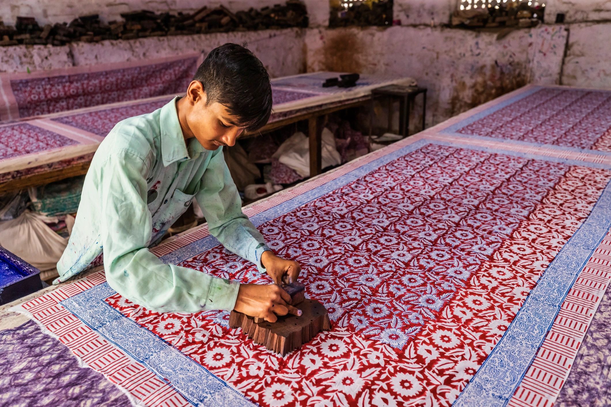 Textile artisan at work in an Indian block printing factory